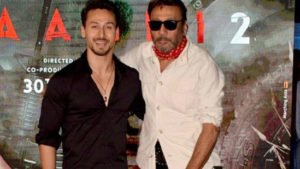 Tiger Shroff crashes dad Jackie's interview, gives him cute kiss.