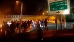 Iran airs video from Evin prison hours after fire with a warning for US