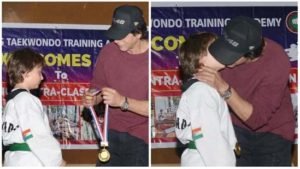 AbRam gets medal from Shah Rukh Khan at Taekwondo match, gives him a kiss. See inside pics from competition